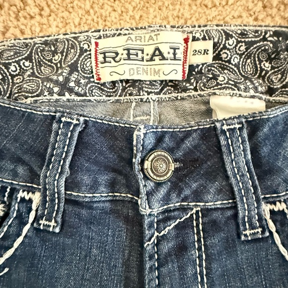 R.E.A.L. Mid Rise Stretch Entwined Boot Cut Jean - Picture 7 of 9